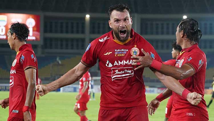 Marko Simic melakukan selebrasi melawan Persib Bandung