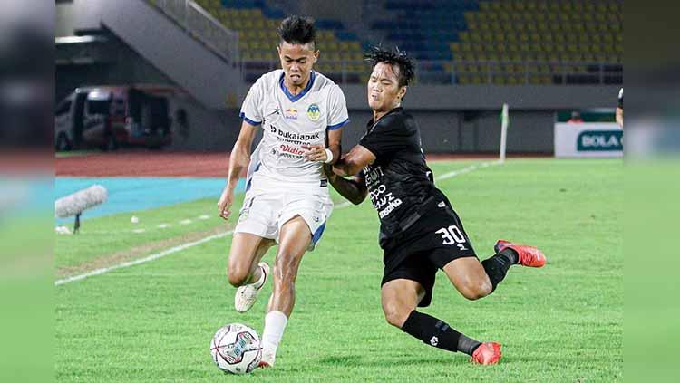 Link live streaming pertandingan perebutan peringkat tiga Liga 2 2021 yang akan mempertemukan PSIM Yogyakarta vs Dewa United. - INDOSPORT