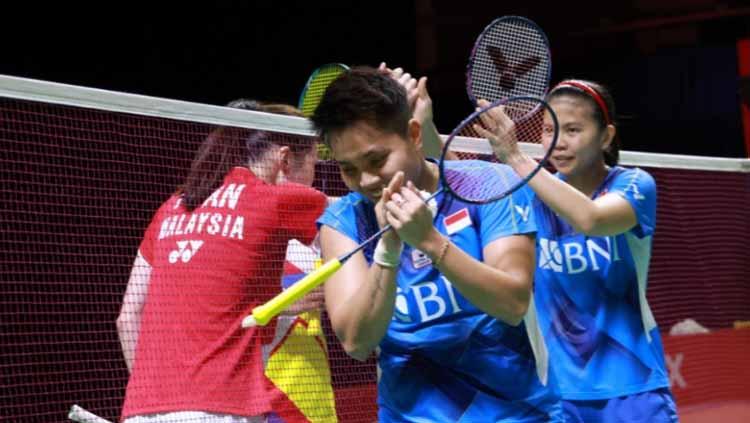 Greysia Polii/Apriyani Rahayu, ganda putri Indonesia, harus memupuskan mimpinya melaju ke final BWF World Tour Finals 2021 usai tersingkir dari babak semifinal. - INDOSPORT