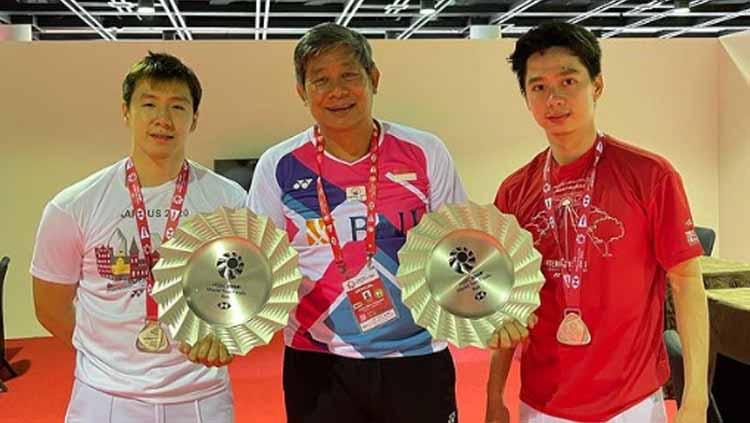 Reaksi tengil pelatih Herry Iman Pierngadi (Herry IP) viral saat melihat pukulan tipu-tipu Kevin Sanjaya di Malaysia Masters 2023 yang berakhir kocak.