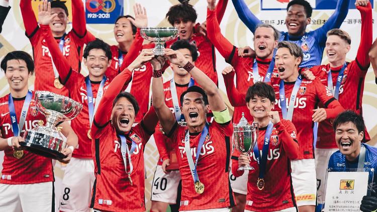 Urawa Red Diamonds mampu menjadi juara Piala Kaisar alias Emperor's Cup 2021 dengan mengalahkan Oita Trinita di partai puncak, Minggu (19/12/21). - INDOSPORT