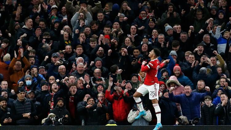 Selebrasi Jadon Sancho usai membawa Manchester United unggul 1-0 atas Middlesbrough (05/02/22). (Foto: REUTERS/Craig Brough) - INDOSPORT