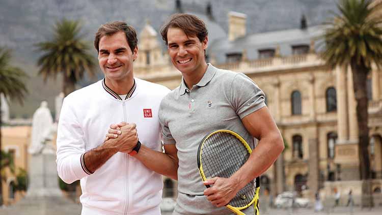Raksasa Liga Spanyol, Real Madrid, ingin menjadi tuan rumah pertarungan Roger Federer vs Rafael Nadal di Santiago Bernabeu menyusul petenis Swiss itu pensiun. FOTO: REUTERS/Mike Hutchings/File Photo - INDOSPORT