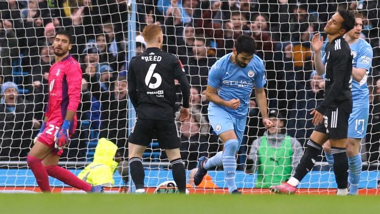 Ilkay Gundogan merayakan gol di laga Piala FA Manchester City vs Fulham (05/02/22). (Foto: Reuters/Jason Cairnduff)