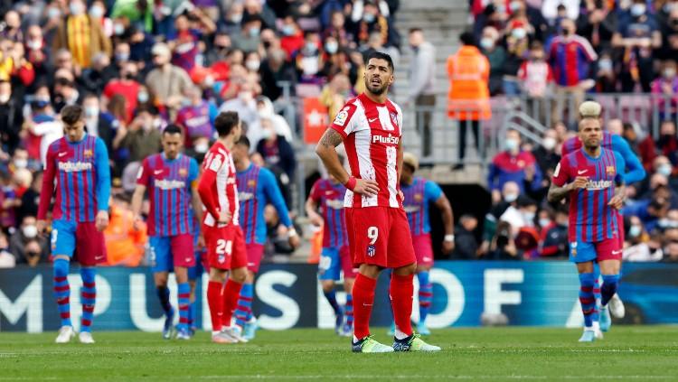 Ekspresi Luis Suarez ketika Barcelona berhasil mencetak gol kedua ke gawang timnya, Atletico Madrid (06/02/22). (Foto: REUTERS/Albert Gea)