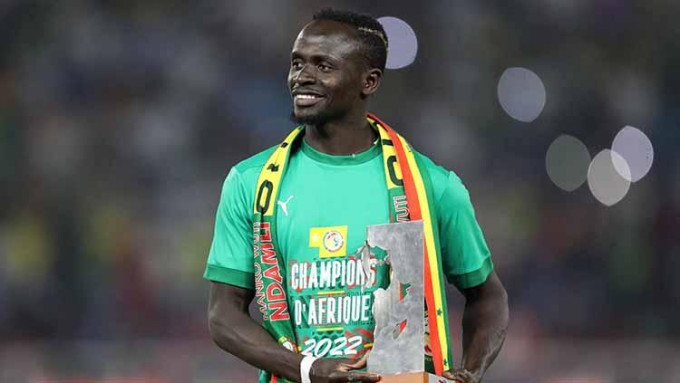 Bintang Liverpool, Sadio Mane, akan dijadikan nama stadion di Senegal setelah sukses mengantarkan negaranya menjadi juara Piala Afrika 2022. FOTO: REUTERS/Mohamed Abd El Ghany - INDOSPORT