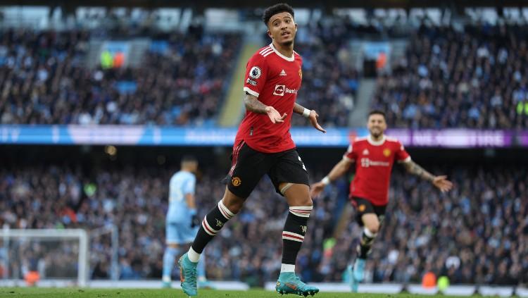 Selebrasi Jadon Sancho usai mencetak gol ke gawang Manchester City (06/03/22). (Foto: Reuters/Carl Recine) Copyright: Reuters/Carl Recine