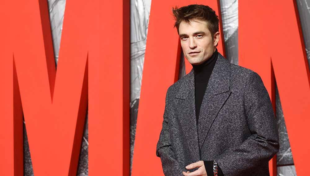 Aktor Robert Pattinson saat peluncuran 'The Batman' di London, Inggris 2022. Foto: REUTERS/Tom Nicholson - INDOSPORT
