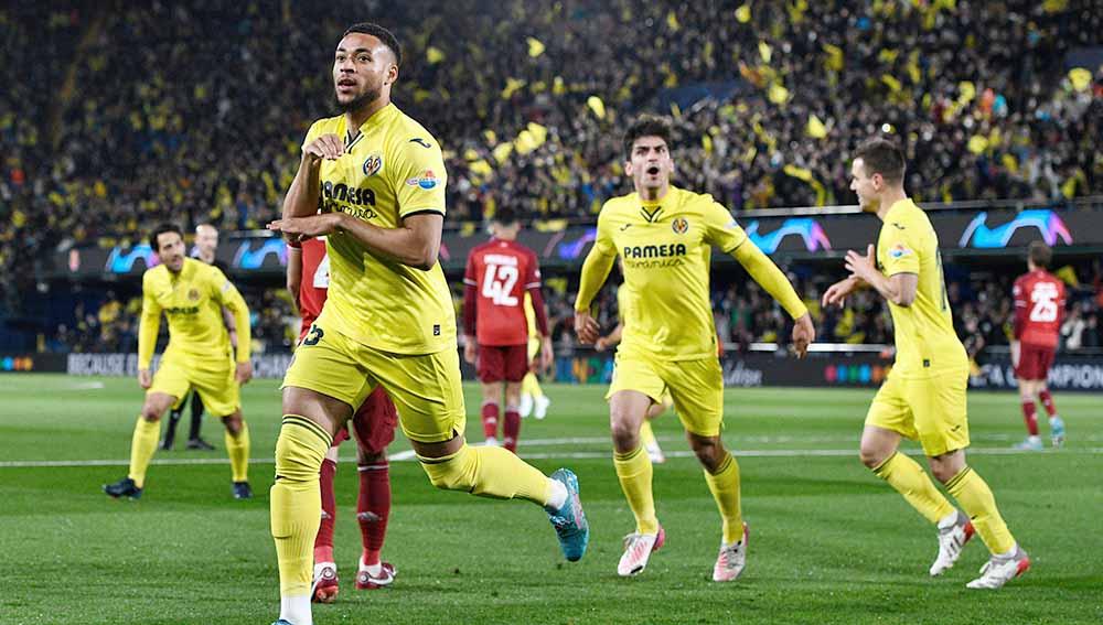 Selebrasi pemain Villarreal, Arnaut Danjuma merayakan gol pertama bersama rekan setim di laga perempat final Liga Champions, Kamis (07/04/22). Foto: REUTERS/Pablo Morano - INDOSPORT