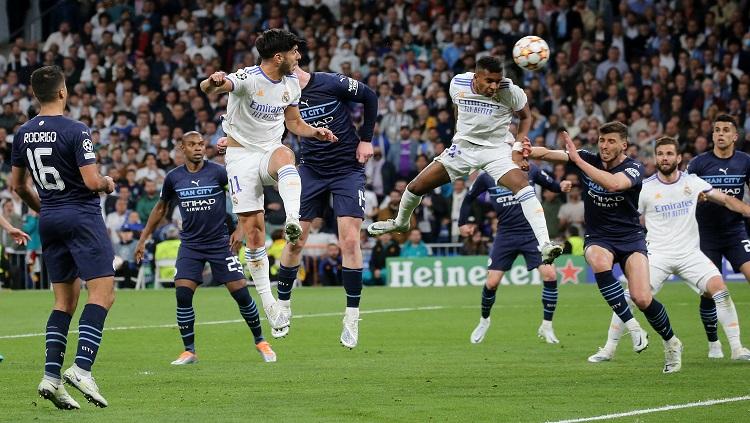 Momen Rodrygo Goes saat mencetak gol kedua ke gawang Manchester City di semifinal Liga Champions pada Kamis (05/05/22) dini hari WIB. - INDOSPORT