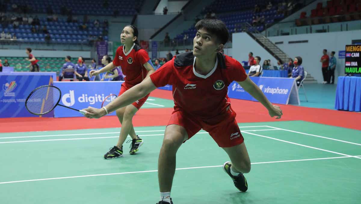 Adnan Maulana yang tampil dengan menggandeng pasangan baru Nita Violina Marwah langsung ngegas di Malang Indonesia International Challenge 2022. Foto: PBSI