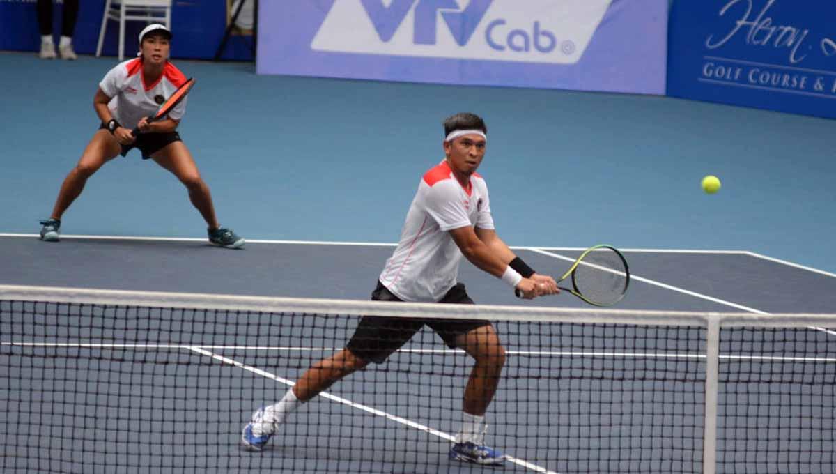 Aldila Sutjiadi dan Christopher Rungkat gagal mempertahankan gelar di Asian Games 2022. Foto: Tennis Indonesia/Dwi Ari Setyadi. - INDOSPORT