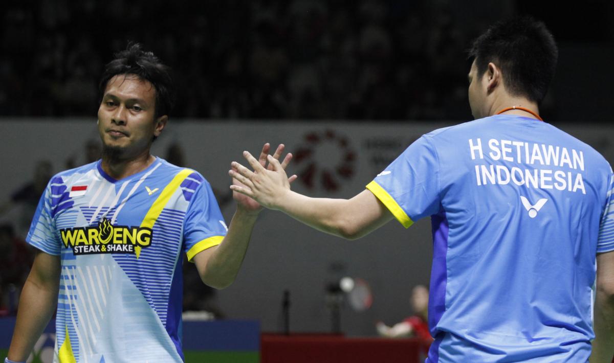 Mohammad Ahsan sedang betah bermain di China Badminton Super League 2023, sang istri yakni Christine Novitania malah jadi atlet bulutangkis. - INDOSPORT