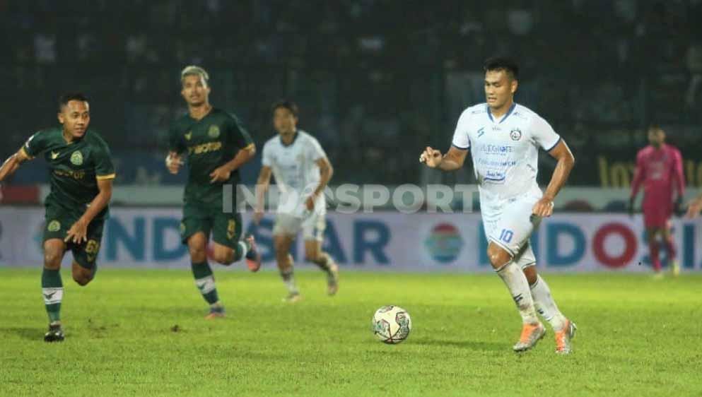 Pemain Arema FC, Muhammad Rafli tampil usai membela Timnas Indonesia. - INDOSPORT