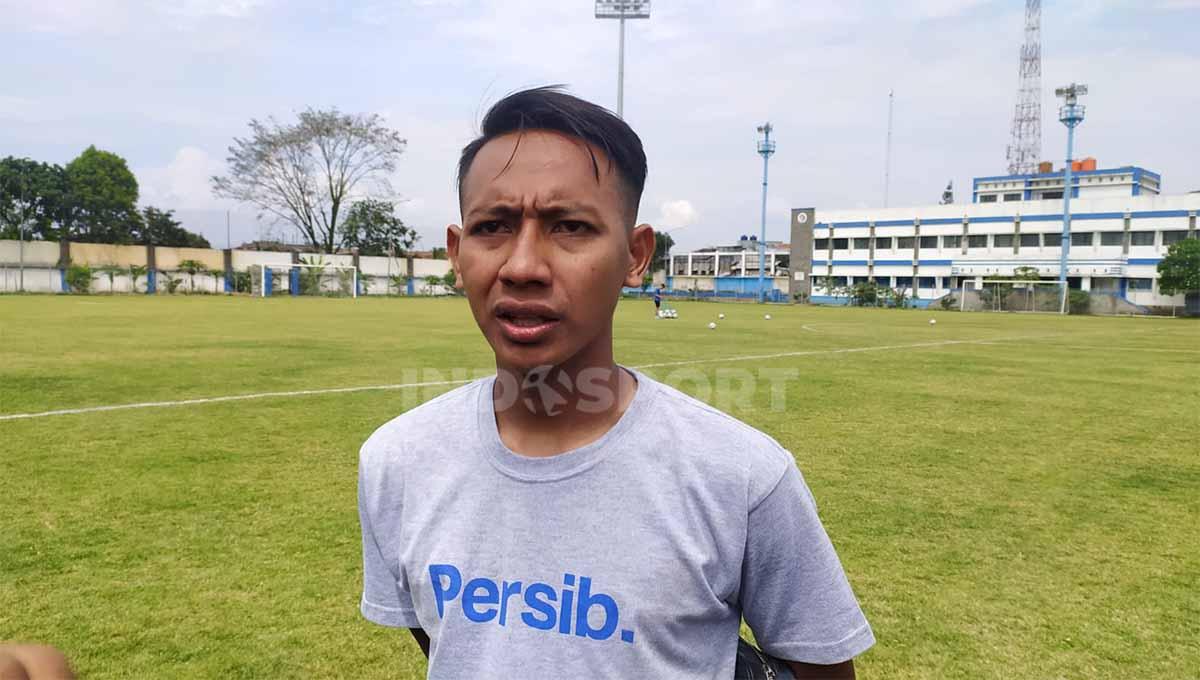 Gelandang Persib Bandung, Beckham Putra Nugraha, mendukung keputusan dihentikannya sementara kompetisi Liga 1 2022-2023, karena tragedi yang terjadi di Stadion Kanjuruhan, Malang, Sabtu (01/10/22). - INDOSPORT