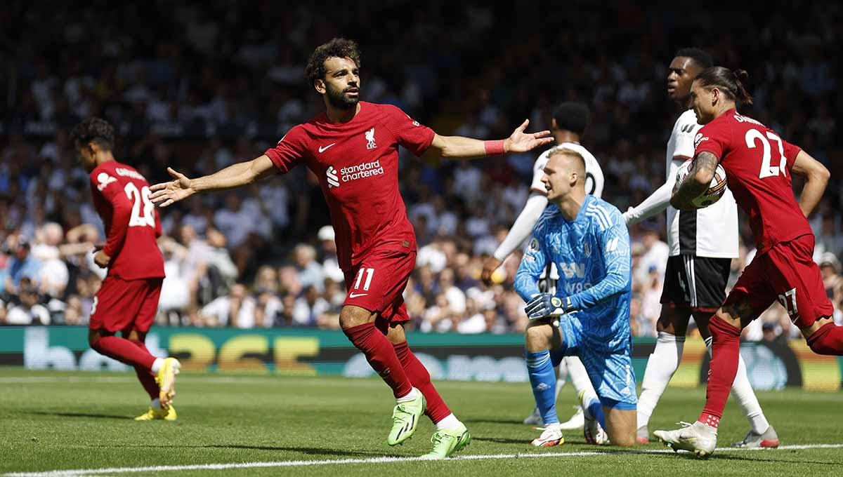 Selebrasi pemain Liverpool Mohamed Salah usai mencetak gol ke gawang Fulham di Liga Inggris, Minggu (06/08/22). Foto: Reuters/Peter Cziborra - INDOSPORT
