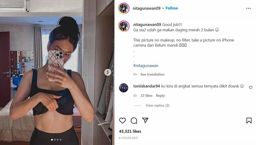 Selebgram berparas cantik, Nita Gunawan, baru-baru ini memamerkan perut rata dengan foto di depan ranjang melalui Instagram. Foto: Instagram@nitagunawan09