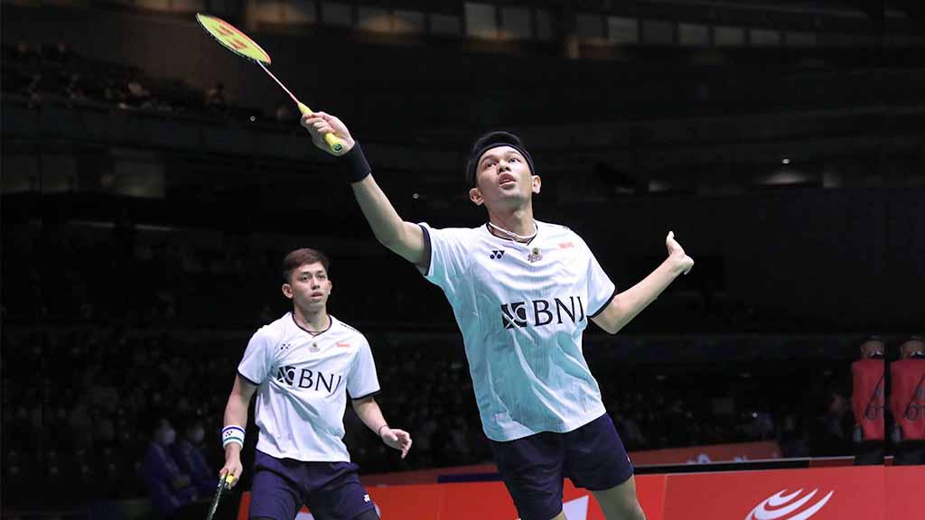Hasil Kejuaraan Dunia Bulutangkis 2022 babak 16 besar di mana Fajar Alfian/Muhammad Rian Ardianto menang atas Ben Lane/Sean Vendy 11-21 dan 16-21. Foto: PBSI