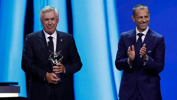 Pelatih Real Madrid, Carlo Ancelotti, memenangkan gelar pelatih terbaik Eropa dari UEFA. - INDOSPORT