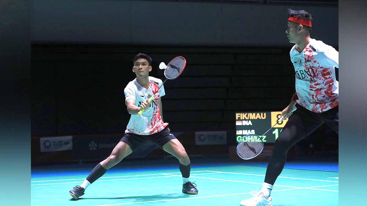Pasangan ganda putra Indonesia Muhammad Shohibul Fikri dan Bagas Maulana di kejuaraan bulutangkis Japan Open 2022. Foto: PBSI