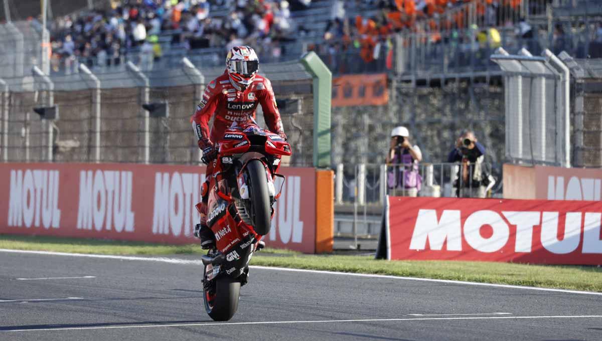 Aksi pembalap Ducati Jack Miller merayakan kemenangannya. Foto: REUTERS/Issei Kato - INDOSPORT