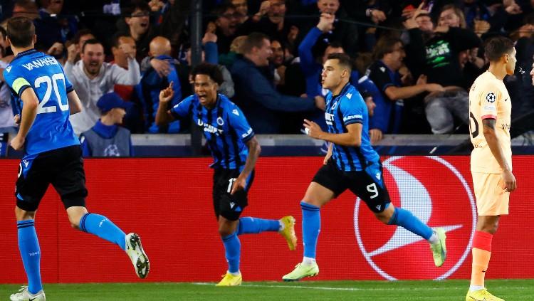 Para pemain Club Brugge merayakan gol ke gawang Atletico Madrid (05/10/22). (Foto: REUTERS/Yves Herman)