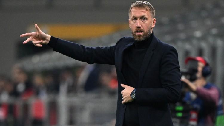 Pelatih Chelsea, Graham Potter, di laga kontra AC Milan (12/10/22). (Foto: REUTERS/Alberto Lingria) Copyright: REUTERS/Alberto Lingria