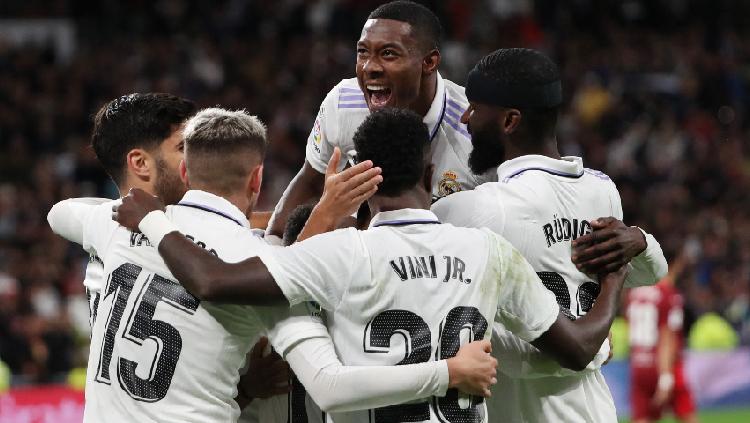 Pemain Real Madrid Lucas Vazquez merayakan mencetak gol kedua mereka dengan rekan setim REUTERS-Violeta Santos Moura - INDOSPORT