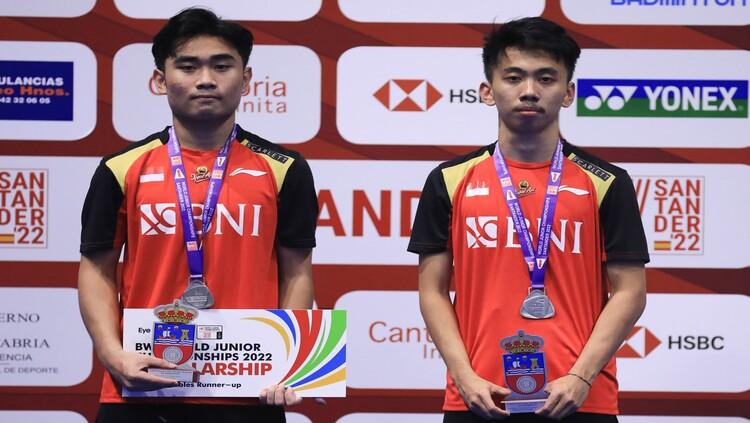 Muh. Putra Erwiansyah/Patra Harapan Rindorindo meraih medali perak di Kejuaraan Dunia Junior 2022 - INDOSPORT