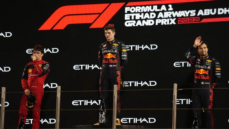 Max Verstappen, Charles Leclerc dan Sergio Perez naik podium di F1 GP Abu Dhabi 2022 (REUTERS/Aleksandra)