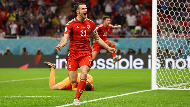 Gareth Bale Usai Cetak Gol untuk Wales di Piala Dunia 2022 REUTERS-Hannah Mckay - INDOSPORT