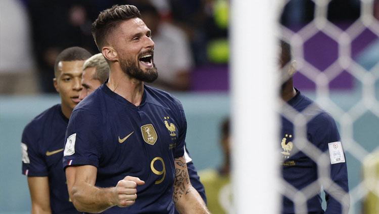 Striker AC Milan, Olivier Giroud membutuhkan satu gol lagi di Piala Dunia 2022, untuk melampaui rekor Thierry Henry sebagai pencetak gol terbanyak Prancis.(Foto: REUTERS/Issei Kato).