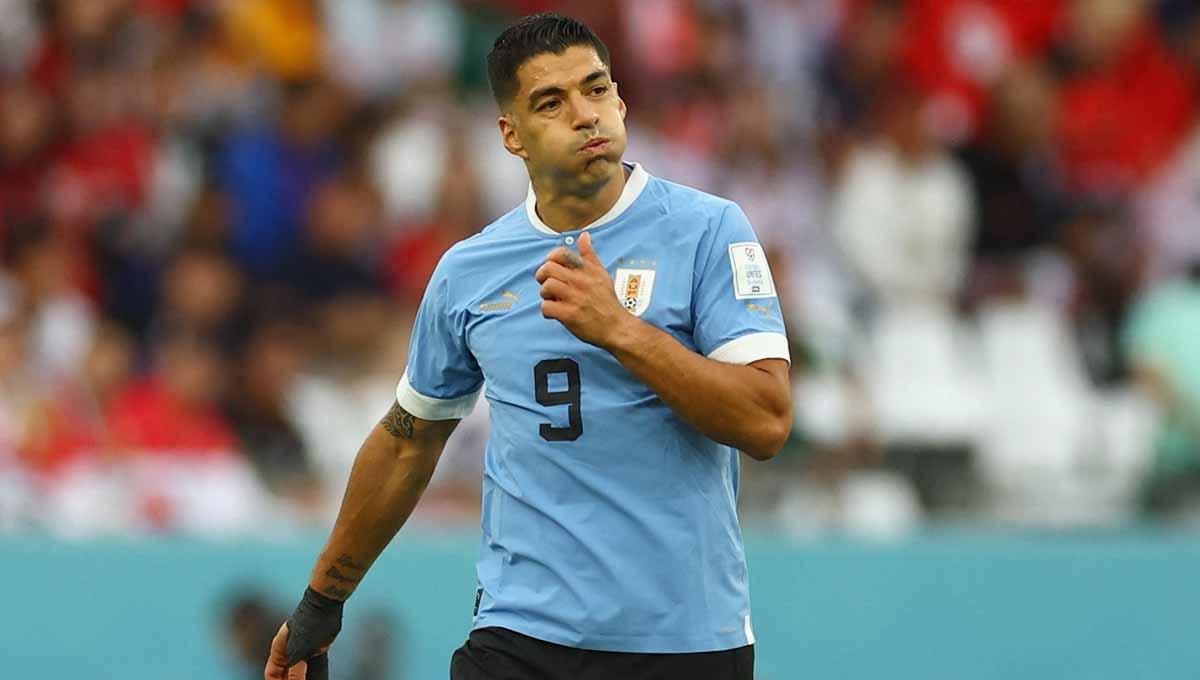 Reaksi pemain Uruguay Luis Suarez REUTERS saat menghadapi Korea Selatan di Piala Dunia Qatar 2022. (Foto: REUTERS/Kai Pfaffenbach) - INDOSPORT