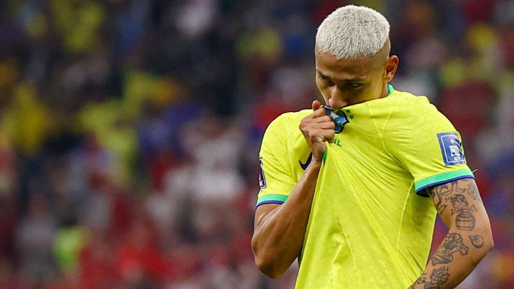 Selebrasi bintang Brasil, Richarlison usai cetak gol ke gawang Serbia dalam pertandingan pertama Grup G Piala Dunia 2022 (Foto: REUTERS/Kai Pfaffenbach)