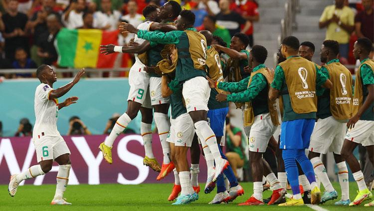 Selebrasi para pemain Senegal usai Boulaye Dia mencetak gol ke gawang Qatar dalam laga kedua Grup A Piala Dunia 2022 (Foto:REUTERS/Kai Pfaffenbach). Copyright: REUTERS/Kai Pfaffenbach