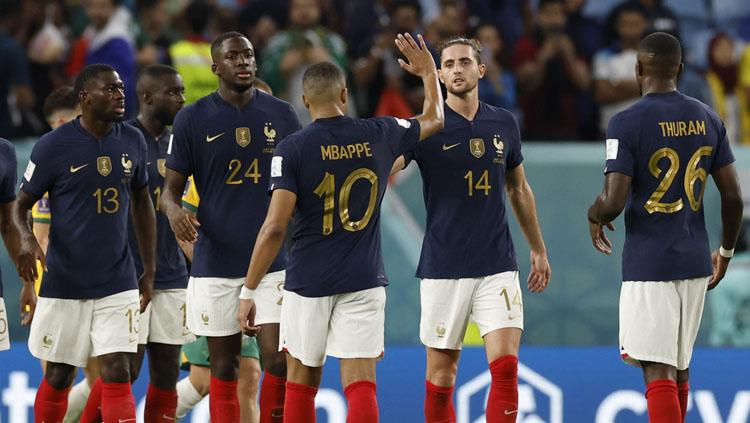 Timnas Prancis lolos ke 16 besar Piala Dunia 2022 dengan catatan mengerikan. Foto: REUTERS/Issei Kato. - INDOSPORT