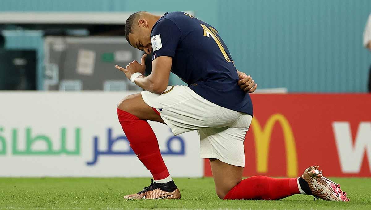Bintang Prancis Kylian Mbappe berselebrasi usai mencetak gol di grup D Piala Dunia Qatar 2022. (Foto: REUTERS/Kim Hong-Ji) - INDOSPORT