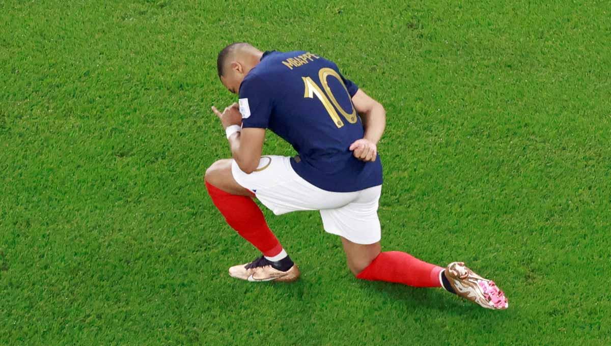 Bintang Prancis Kylian Mbappe berselebrasi usai mencetak gol di grup D Piala Dunia Qatar 2022. (Foto: REUTERS/Peter Cziborra) Copyright: REUTERS/Peter Cziborra