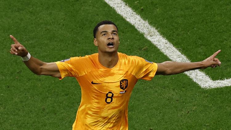 Selebrasi penyerang sayap Belanda, Cody Gakpo usai cetak gol ke gawang Qatar dalam laga terakhir Grup A Piala Dunia 2022 (Foto: REUTERS/Albert Gea). Copyright: REUTERS/Albert Gea