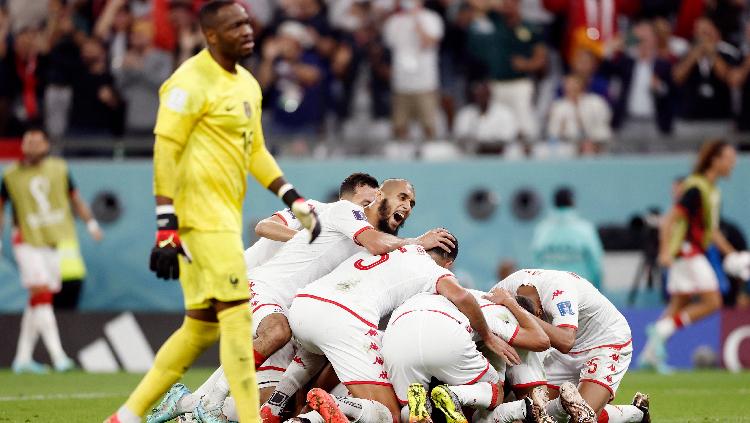 Wahbi Khazri Tunisia merayakan gol pertama Tunisia kontra Prancis di Piala Dunia 2022 REUTERS-Benoit Tessier - INDOSPORT