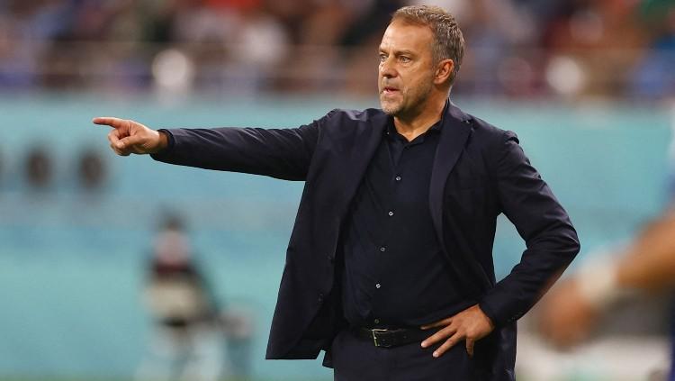 Pelatih Jerman, Hansi Flick di laga Piala Dunia 2022 kontra Jepang (23/11/22). (Foto: REUTERS/Kai Pfaffenbach)