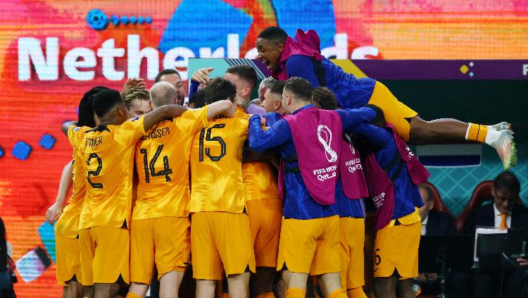 Daley Blind merayakan gol kedua Belanda ke Gawang Amerika Serikat di Piala Dunia 2022 REUTERS-Wolfgang Rattay Copyright: REUTERS-Wolfgang Rattay