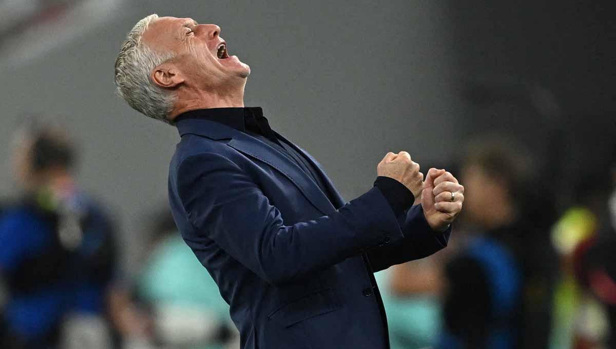 Pelatih Prancis Didier Deschamps merayakan gol ke gawang Polandia. (Foto: REUTERS/Dylan Martinez) - INDOSPORT
