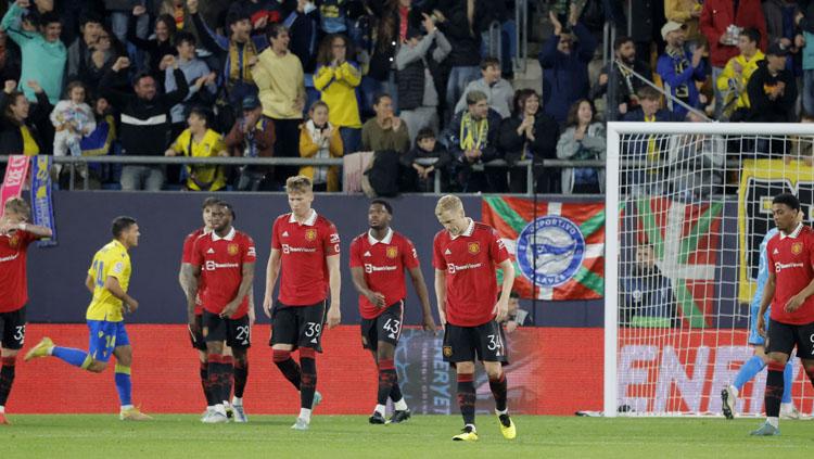 Ekspresi kecewa Manchester United saat tumbang dari Cadiz dalam laga persahabatan (Foto: REUTERS/Jon Nazca). - INDOSPORT