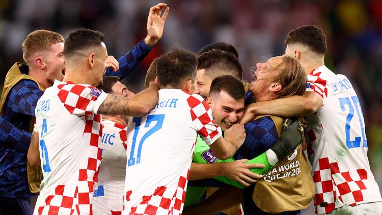 Luapan kegembiraan Timnas Kroasia usai kalahkan Brasil di Babak Perempatfinal Piala Dunia 2022 (Foto: REUTERS/Hannah Mckay)