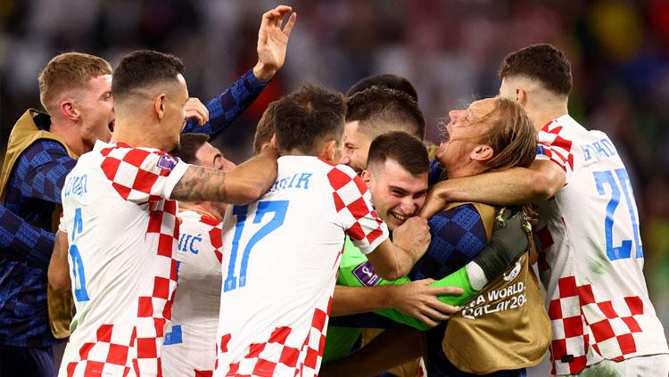 Luapan kegembiraan Timnas Kroasia usai kalahkan Brasil di Babak Perempatfinal Piala Dunia 2022 (Foto: REUTERS/Hannah Mckay) - INDOSPORT