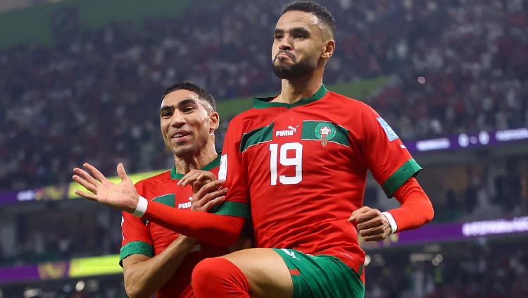 Youssef En-Nesyri merayakan gol pertandingan Maroko vs Portugal di Piala Dunia 2022. Foto: REUTERS-Carl Recine. - INDOSPORT