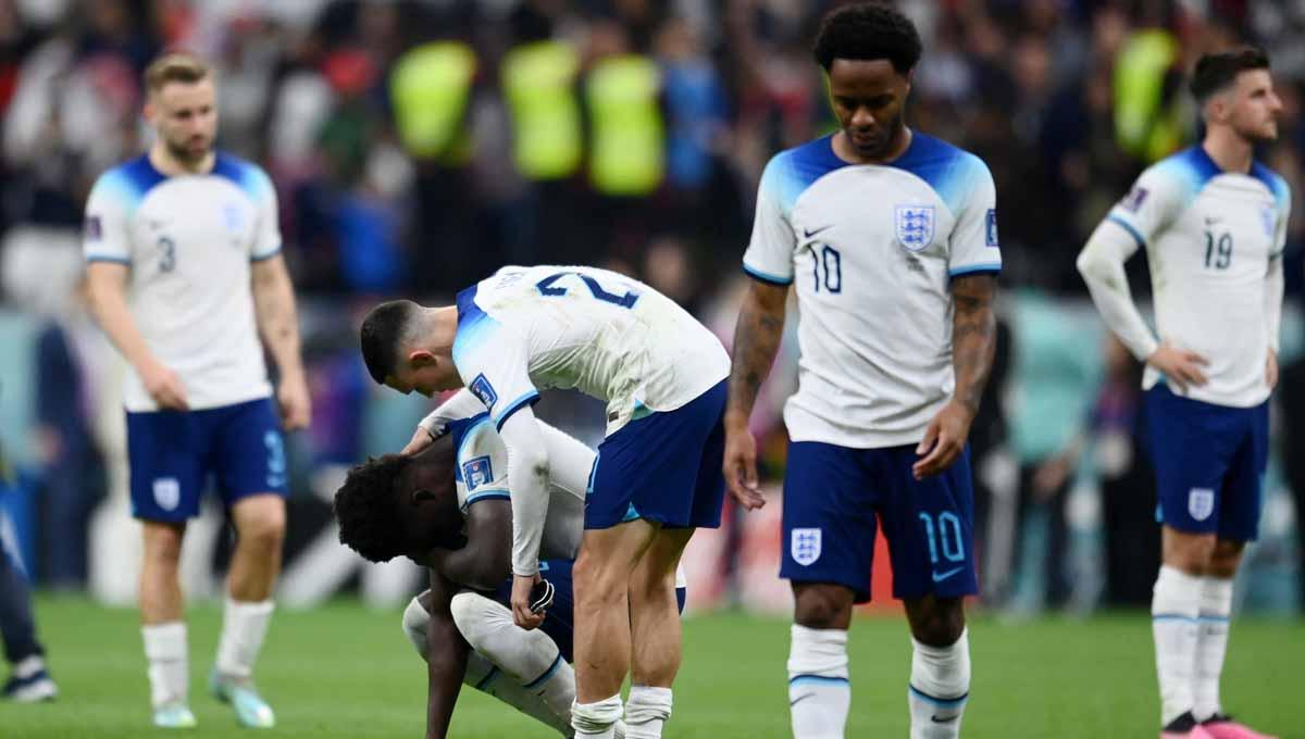 Tidak ada tim lain yang lebih tersakiti dari Inggris, setelah disingkirkan Prancis di babak perempat final Piala Dunia 2022, Minggu (11/12/22). (Foto: REUTERS/Annegret Hilse) - INDOSPORT