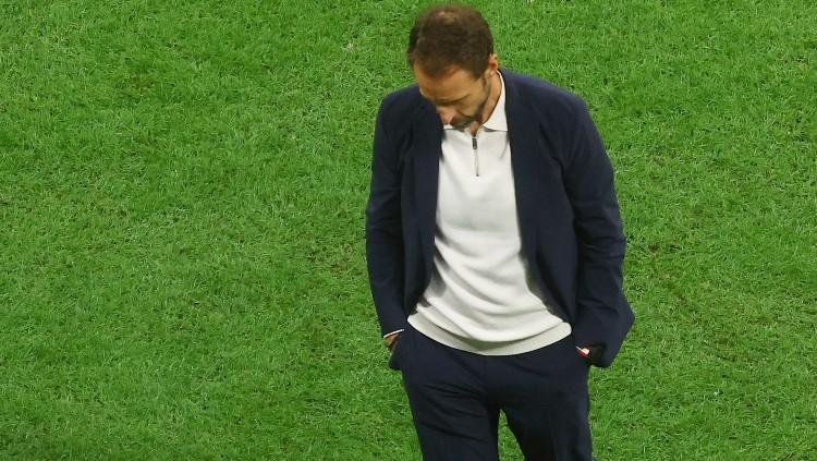 Gareth Southgate tertunduk lesu di laga Piala Dunia 2022 Inggris vs Prancis (11/12/22). (Foto: REUTERS/Lee Smith)