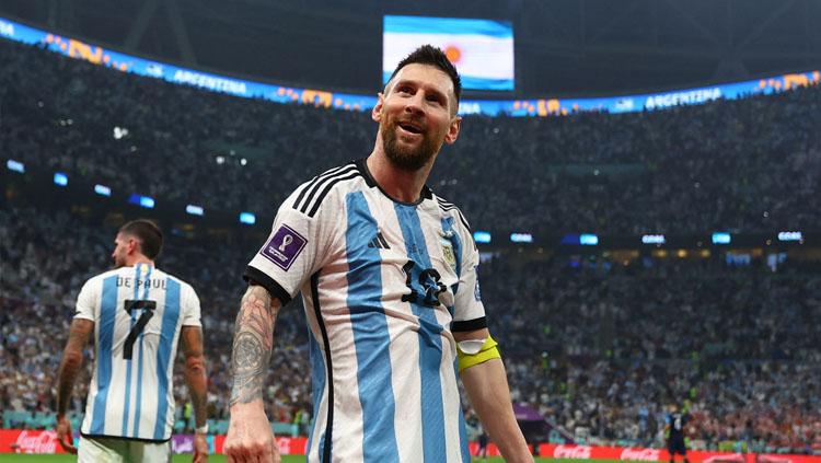 Selebrasi pemain megabintang sekaligus kapten Timnas Argentina, Lionel Messi usai cetak gol ke gawang Kroasia di semifinal Piala Dunia 2022 (Foto: REUTERS/Molly Darlington). - INDOSPORT